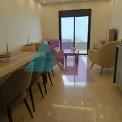 A 110 m2 apartment having an open sea/city view for sale in Dbaye