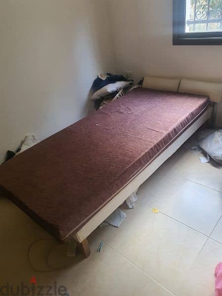 2 single beds with mattress and 3 doors closet 1