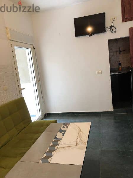 furnished studio for rent in Mar Moussa ستوديو مفروش للايجار في مارموس 10
