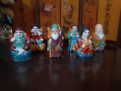 seven Chinese statues as seven days of the week