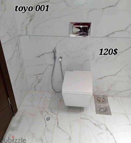كرسي حمام toyo مع مغسلةbathroom toilet sets 7