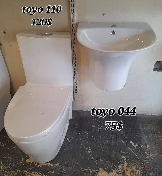 كرسي حمام toyo مع مغسلةbathroom toilet sets 14