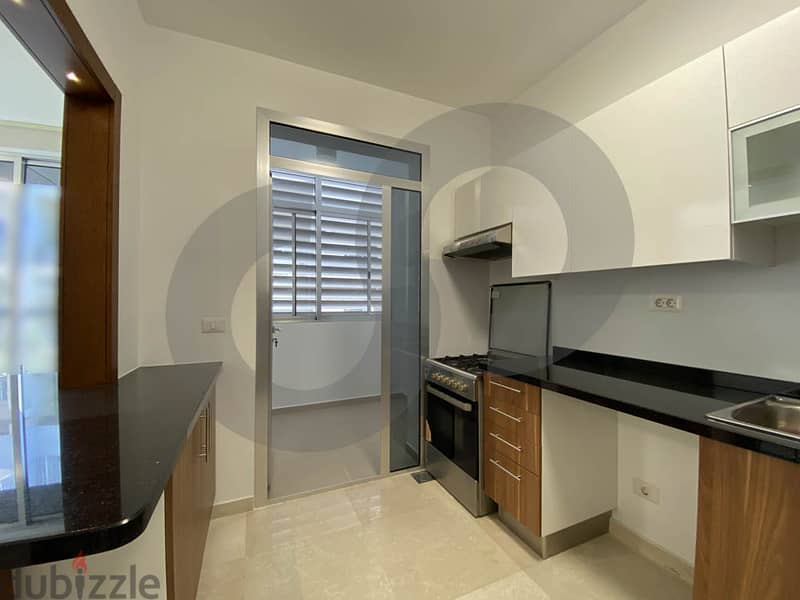 prime location renovated apartment in ashrafieh/الأشرفية REF#PA105346 4