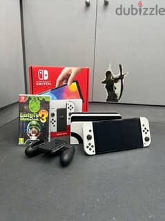nintendo switch oled with game