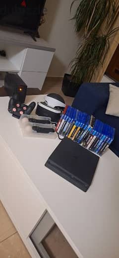ps4 slim + 2 controllers + VR set and controllers + games + ups