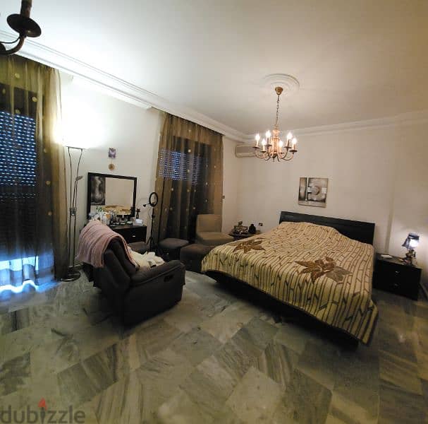 Top-floor apartment with spacious design and unobstructed views 1