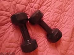 two dumbbells ( 5 kg each ) and one axe with ( 5kg x 4 )