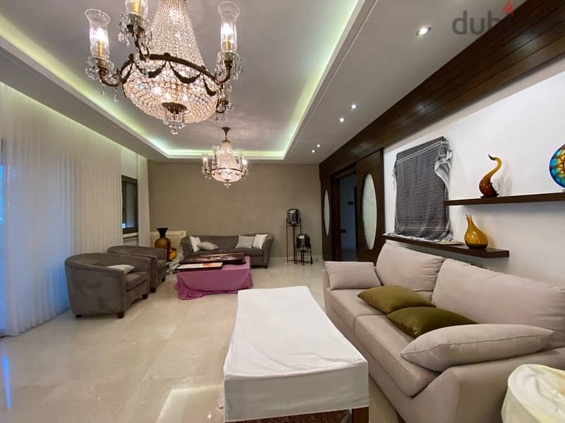 A furnished modern apartment in Ain saade with greenery views. 5