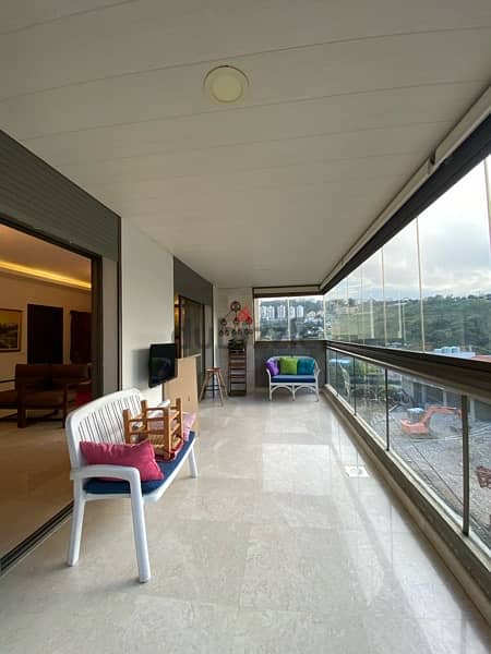 A furnished modern apartment in Ain saade with greenery views. 10