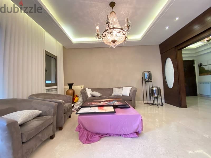 A furnished modern apartment in Ain saade with greenery views. 12