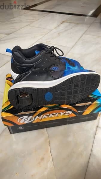 Heelys (Shoes with wheels) 1