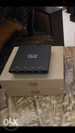 3  cisco ATA 187 + cisco phone and 2 routers 0