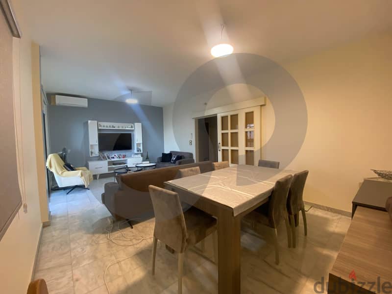 spacious apartment for sale in haret hraik-rewis/حارة حريكREF#DE105558 1