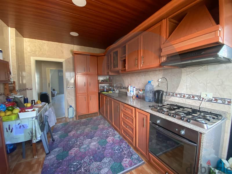 spacious apartment for sale in haret hraik-rewis/حارة حريكREF#DE105558 2