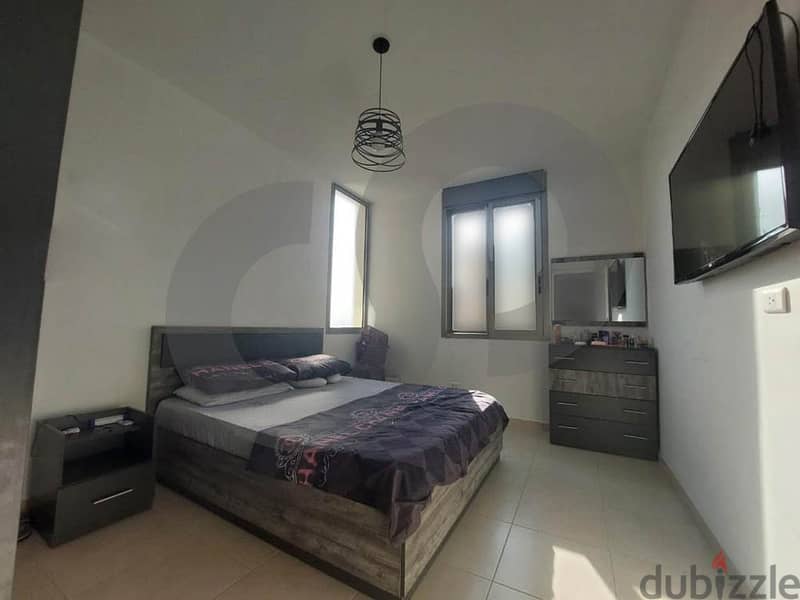 spacious 120 square meter apartment in Baouchrieh/بوشرية REF#RN105601 5