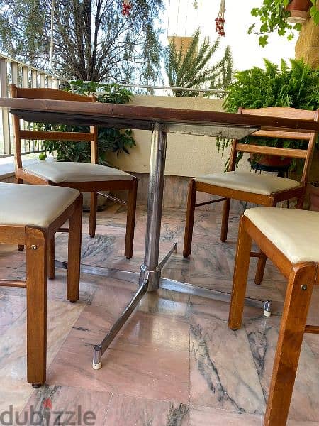 wood table stainless steel stand with four wood chairs 2