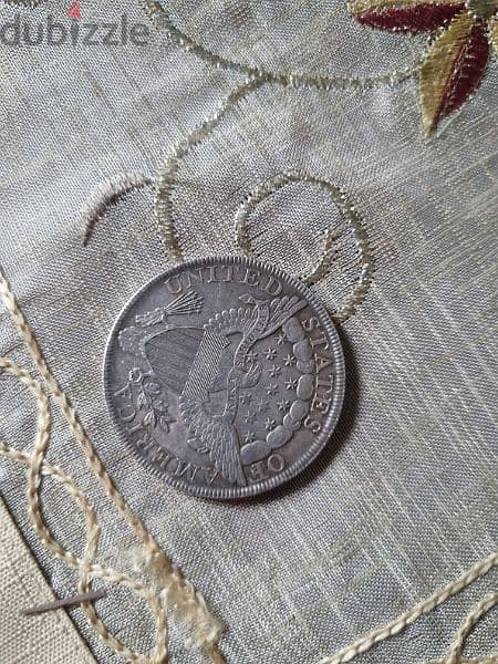 A silver old coin 5