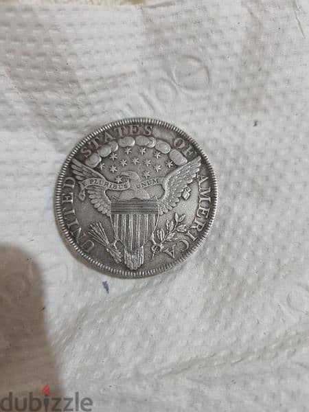 A silver old coin 7 dollars the gram 11