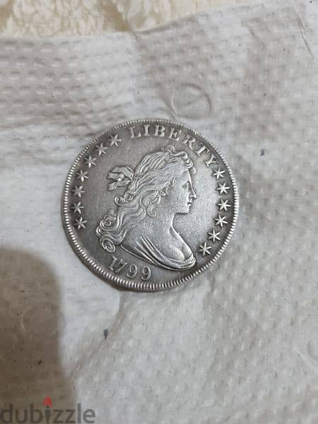 A silver old coin 12