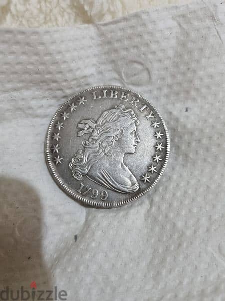 A silver old coin 13