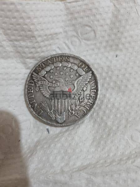 A silver old coin 7 dollars the gram 14