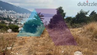 A 7454 m2 land having an open sea view for sale in Adma 0