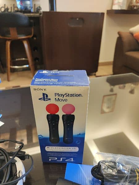 VR PS4+PS5 with move sticks & accessories. 9