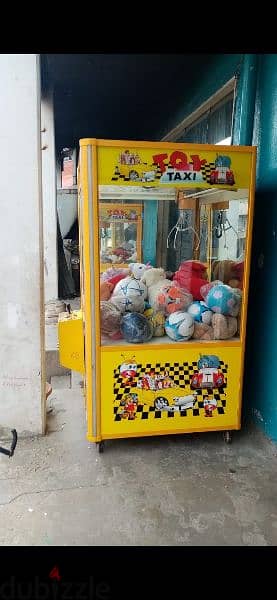 Claw Machine Game toy taxi big size like new 130 cm x 130 cm 1