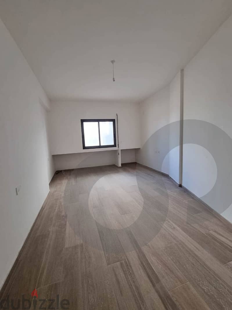 125 SQM modern apartment for sale in Maawad/معوض REF#AH105837 2