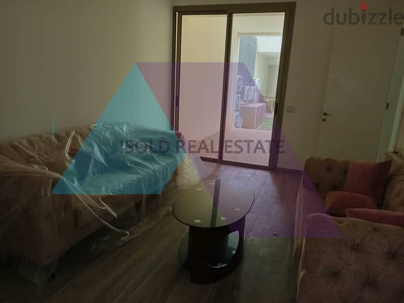 Luxurious 190 m2 apartment with garden & shared pool for sale in Adma 5
