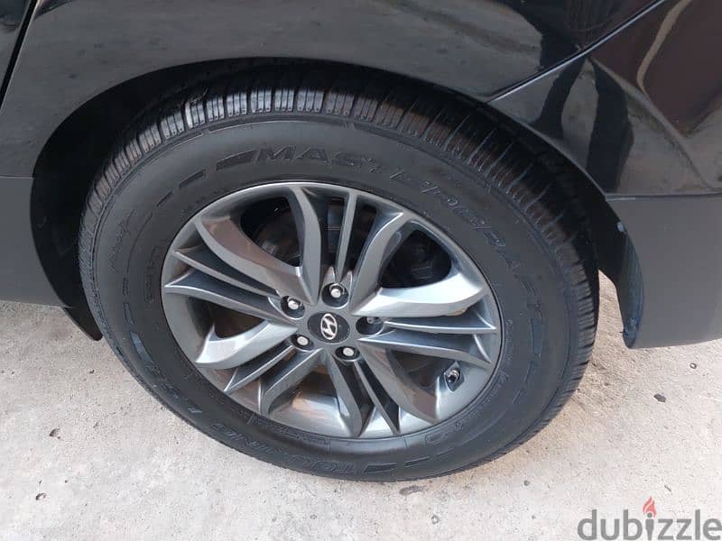 Hyundai Tucson 2015 4cylindres 4×4 clean carfax 6
