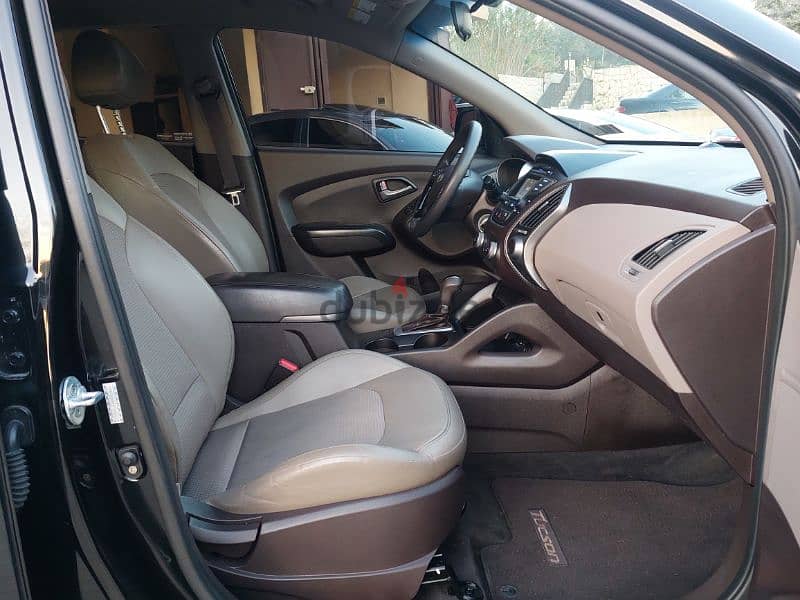 Hyundai Tucson 2015 4cylindres 4×4 clean carfax 7