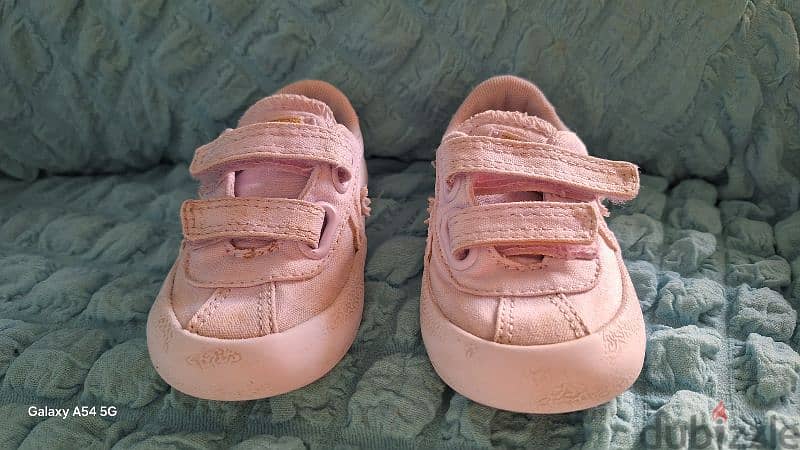 2 shoes (pablosky and converse) for 10 dollars.  girl size 20. 5