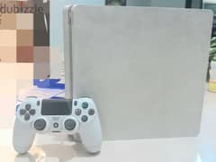 PlayStation 4 slim white + controller + 12 CDs