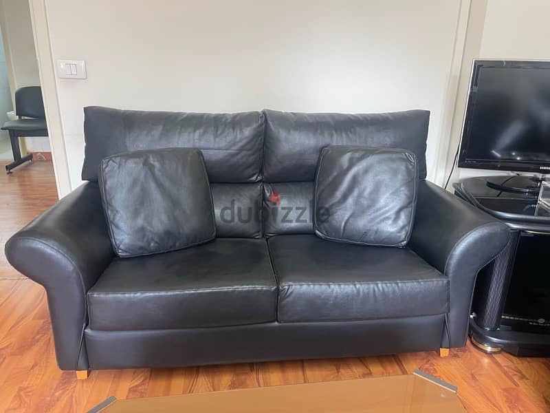 leather sofa x 2 and table 1