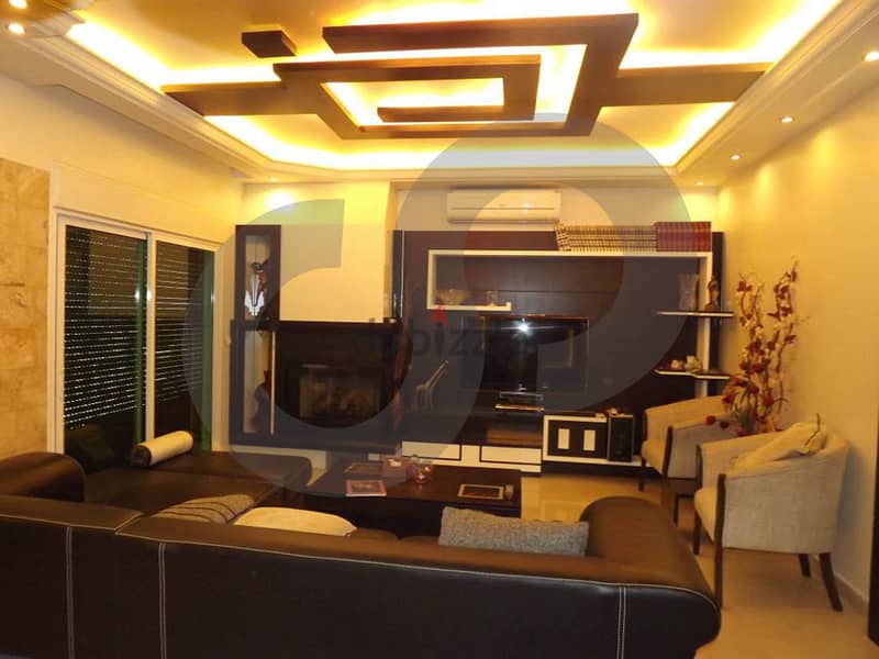 Decorated apartment located in Amchit/عمشيت REF#YD106129 1
