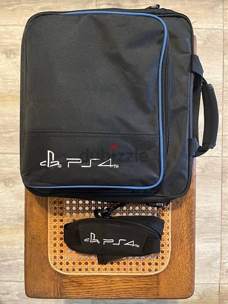 PlayStation 4 Slim, Joysticks, Games, Bag 3