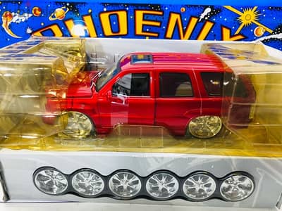 1/18 diecast Cadillac Escalade Spintek Rims (customisable) by Jada