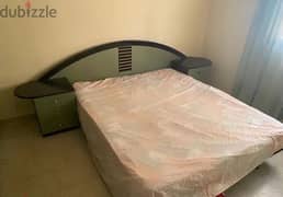full bedroom, with dinning table and chairs and microwv cooler ac gas