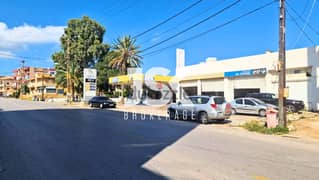 L15302-Land with a Gas Station for Sale On Chekka Main Road