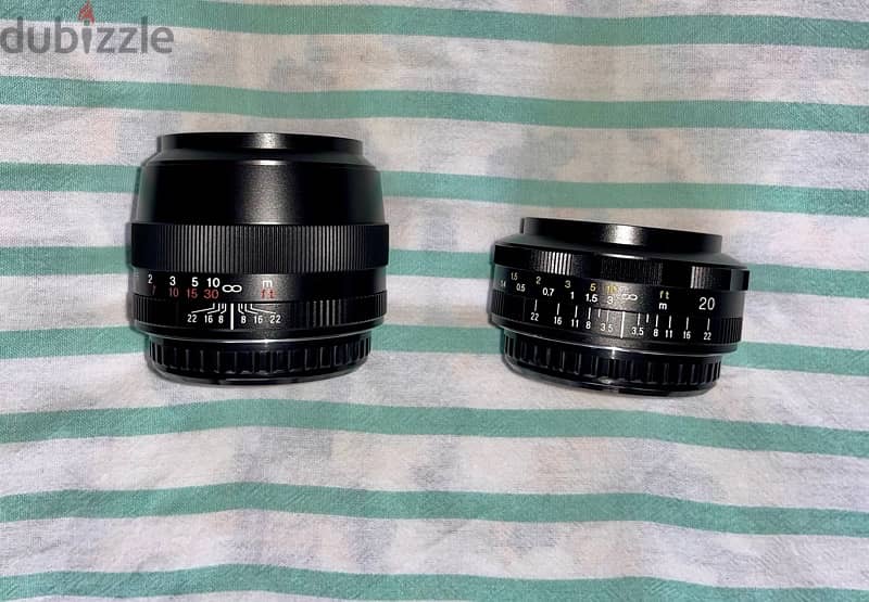 Two Canon EF mount manual focus Voigtlander lenses. -fujifilm sony 1