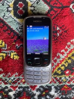 Nokia 6700 Classic (Support WhatsApp but only Voice note and Chat)