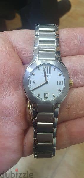 tissot quartz date Swiss made water resistant. 30m sapphire crystal st