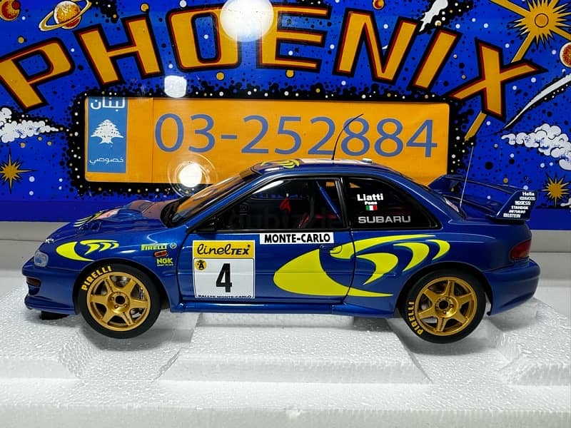 1/18 diecast Autoart Subaru Impreza WRC #4  Monte Carlo Winner 6