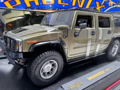 1/18 diecast Hummer H2 Silver by Maisto Thailand (Unused boxed)