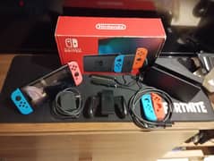 Nintendo switch with accessories and memory card