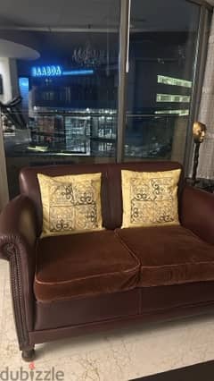 Brown set chairs and sofas