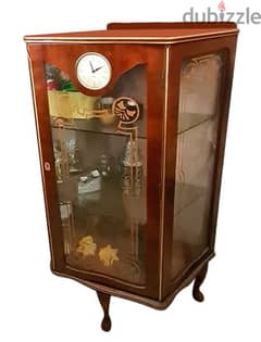 Vintage display cabinet with smith clock
