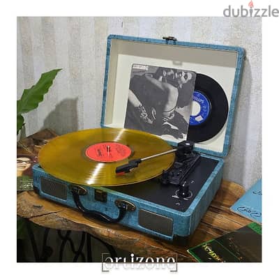 Turntable, vinyl record player  مشغل اسطوانات