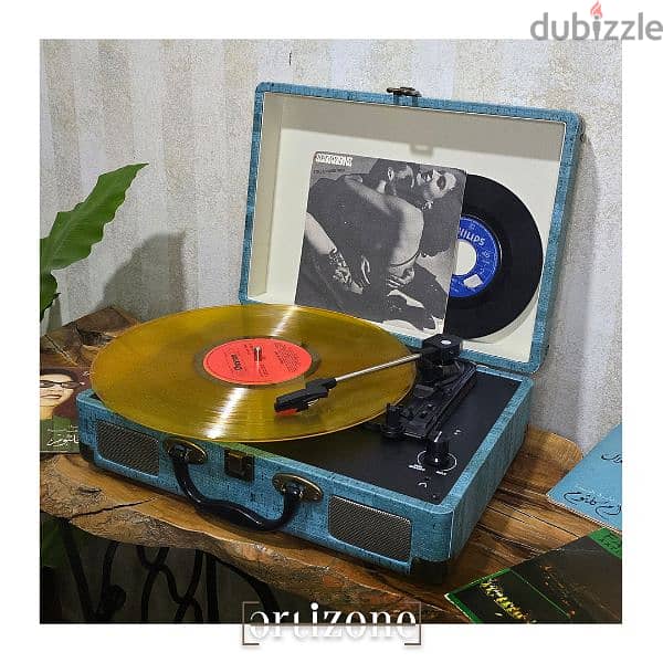 Turntable, vinyl record player  مشغل اسطوانات 0